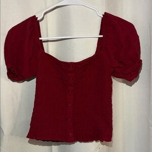 Cropped American eagle shirt, ruffle/puffy sleeves with scrunched fabric.
